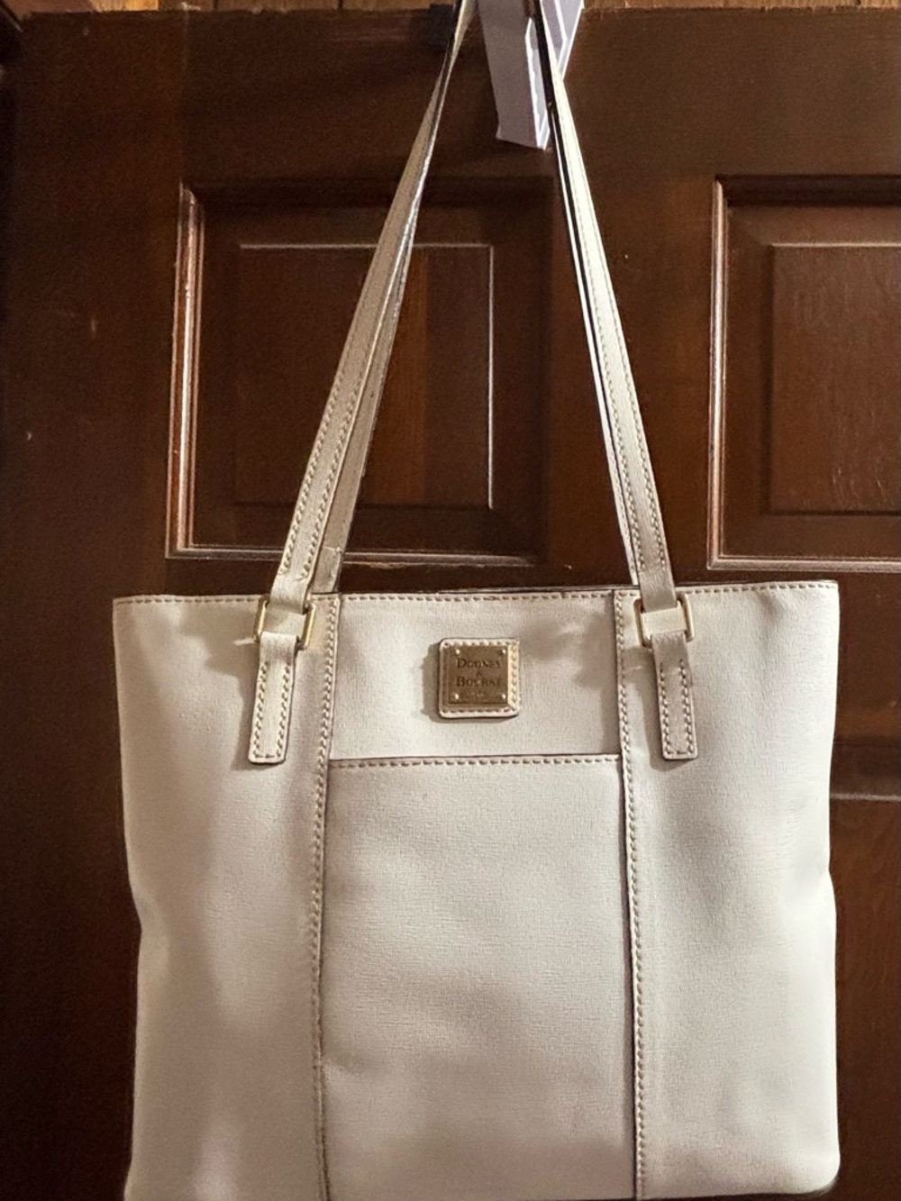 Dooney & Bourke Cream Leather Tote with Gold Plaque